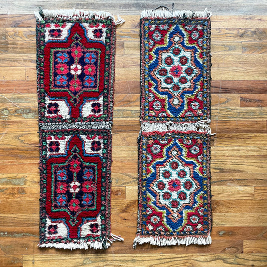 Two tiny-rug runners sitting side by side on a wooden backdrop.