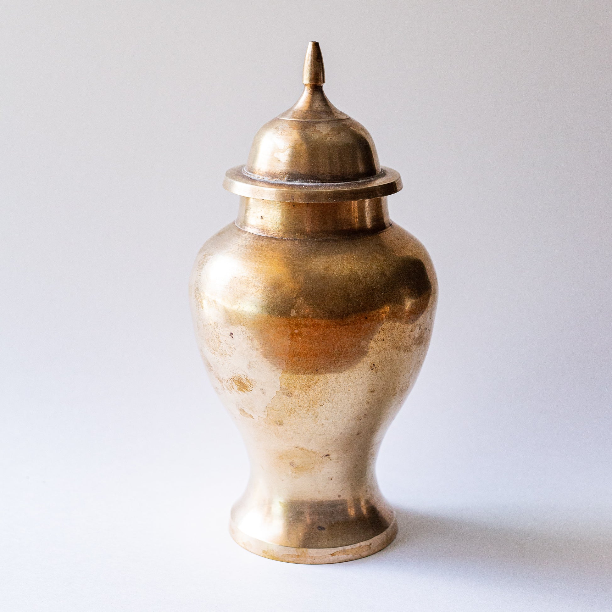Lidded brass temple jar, measured 9 inches tall.
